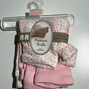 Carter’s Newborn 2 pant set. Pink pair and white pair with pink hearts.